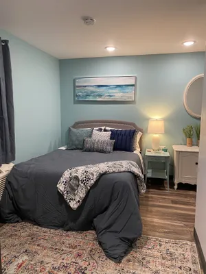 Image of Sycamore Acres 303 Beachy vibes suite with full kitchen and living room