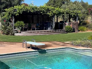 Image of 3 bedroom, 2 bath, pool, new hot tub, outdoor kitchen, bar and lounge, fire pit