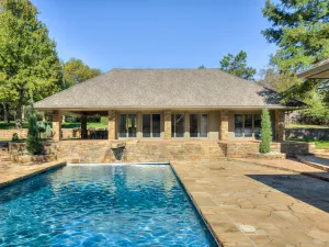 Image of Resort living in Edmond with pool & tennis court!