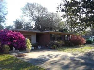 Image of Charming ranch style home with a private patio in quiet neighborhood.