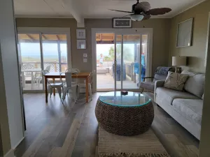 Image of Beach front cottage - don't let the outside fool you - check out the photos!