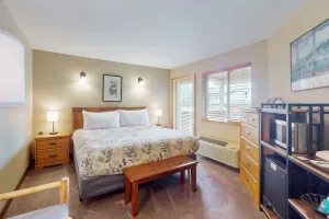 Image of Sunny condo w\/ a balcony, shared pools, hot tub, game room - near downtown