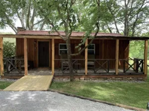 Image of Experience staying in a late 1800’s cabin. Located near the Tennessee River