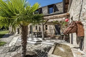 Image of La Case à Tom with enclosed wooded park, private swimming pool, children's playground in Lozère