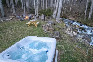 Image of Relaxing Hot Tub by Creek, Fire Pit Near Smokey Mountain National Park