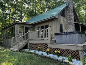Image of Cabin with hot tub, fire pit, and fishing pond.