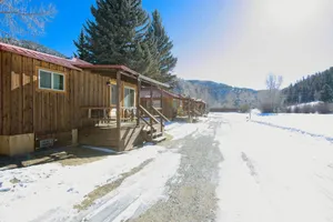 Image of Located on our Private Fishing Pond with Mountain View