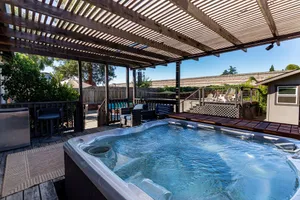 Image of Bright 3 Bedroom Retreat with Outdoor Oasis & Spa