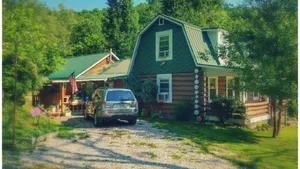 Image of The Lodge The Original Chestnut Log Cabin
