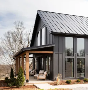 Image of Cottage with panoramic hilltop views and stocked pond on 80 acres.