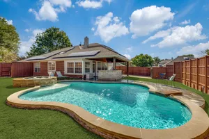 Image of Relax in this 4-bedroom vacation home! Pool. Hot tub. Game Room!!
