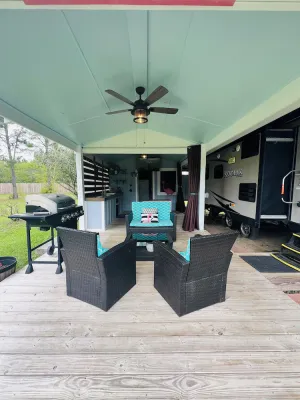 Image of Delightfully Tacky RV w\/ Outdoor Living Space
