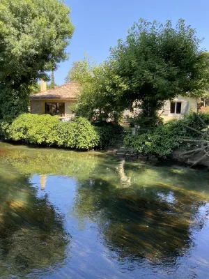 Image of Paradise, relax by the river in peace with your feet in the water