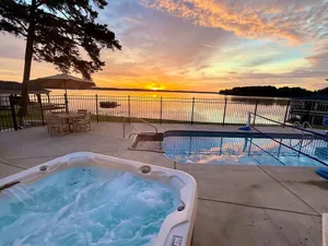 Image of 🔥Luxe Lakefront Escape! HEATED Pool🌊Hot Tub✨Stunning Sunrise🌅8BR+Guest House!