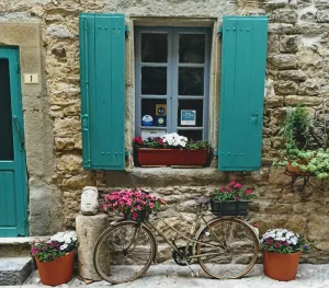 Image of Typical stone house, in a small cobbled street, behind the chateau of Cesseras..