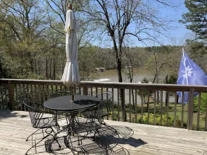 Image of Lakefront home on Lake Hartwell.  Covered boat slip, swim deck.  Kayaks to use.