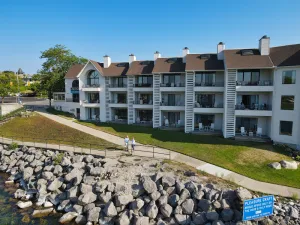 Image of Lake Charlevoix Views with Walkout Patio | Pool, Hot Tub, Sauna