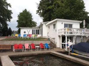 Image of Year round Lake home w\/wonderful frontage, nice yard w\/ fire pit, home theatre