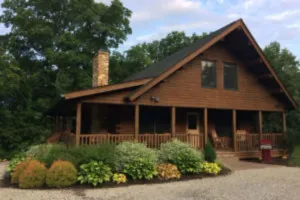 Image of Secluded Log Cabin getaway, with hot tub, and a beautiful view.