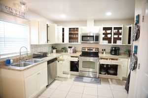 Image of Beachy Oasis Queen Bedroom with Shared Lavatory