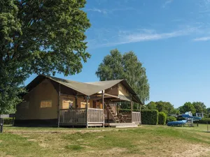 Image of Experience luxury glamping in the elevated Safari Tent Ranger by the water.