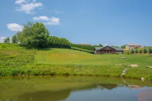 Image of Log Cabin in West Jefferson - Fishing Pong + Hot Tub + Fire Pit + Mountain Views