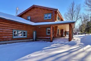 Image of Scandinavian hand-scribed full log home on 31 acres and a quiet lake and trails