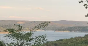 Image of Family friendly. Swim beach below house