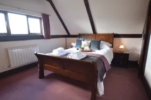 Image of Cottage attached to Moated Farmhouse centrally situated in Suffolk
