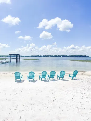 Image of Beautiful home with white sand beach on stunning Crooked Lake