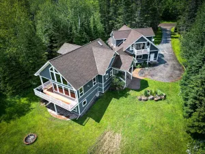 Image of Rare large contemporary four bedroom home with forest and lake views + EV Charge