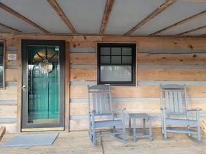 Image of Cozy cabin inviting you to \"Just Breathe\"