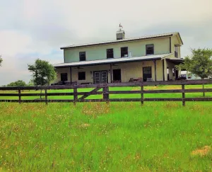 Image of Two story 4 BR 3 BA Ranch home with lake views on 160 acres