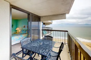 Image of Fascinating beach condo with balcony, pools, game room, sauna & AC