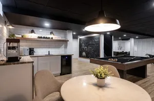 Image of Lake house with a game room