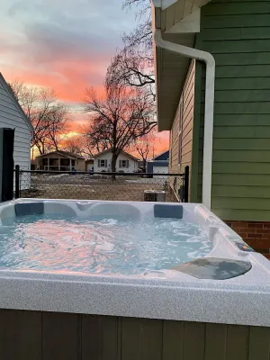 Image of 2-bedroom vacation home; 1 mile from DT: Hot Tub, 86\" TV, Golf, + Fenced Yard
