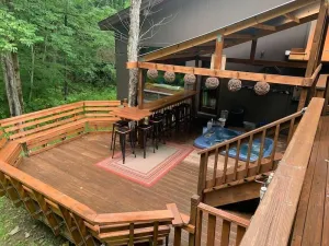 Image of Best of both worlds; chalet located on a private lot in the woods and only 3 miles from the village!