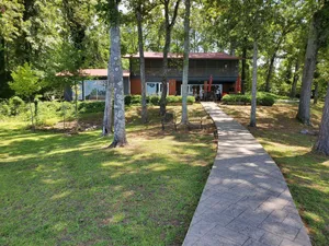 Image of \"One-of-a-kind\" Lake Martin Property With Large Boat Ramp, Boathouse & Pier