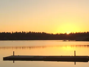 Image of Private Gated Water Lake Front Home.  Private beach and dock near Chamber Bay GC