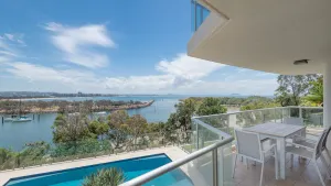 Image of 2 bedroom luxurious apartment surrounded by the ocean with pool beach views