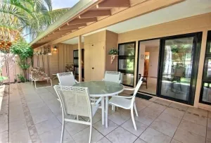 Image of Low rise, tropical oasis, corner, spacious lanai and kitchen, AC and pool.