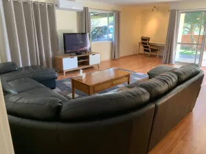 Image of Flynn's Beach House - surfing\/fishing\/walking\/cycling in a quiet street