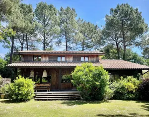 Image of WOODEN HOUSE TYPICAL OF THE BASIN