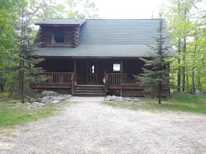 Image of A beautiful log cabin home on Lake Huron, amazing lake views, hot tub, game room