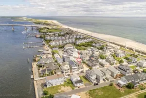 Image of Cozy beach house with yard and parking