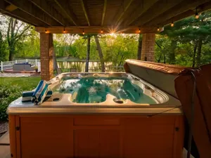 Image of Spacious Mississippi River Retreat-Hot Tub, Massage Chair & Room for 16
