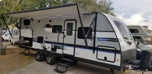 Image of Entire RV w\/Murphy Bed, 5-Seater Couch w\/Dinette & 2-Bunkbeds