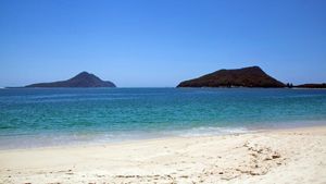 Image of Views across the Bay and just steps from the beach