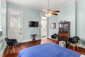 Image of Fab Studio on Tree-Lined Street w City Bikes