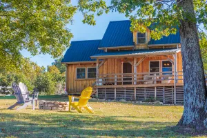 Image of Amish-built cabin, serene and peaceful with pond and private dock for fishing.